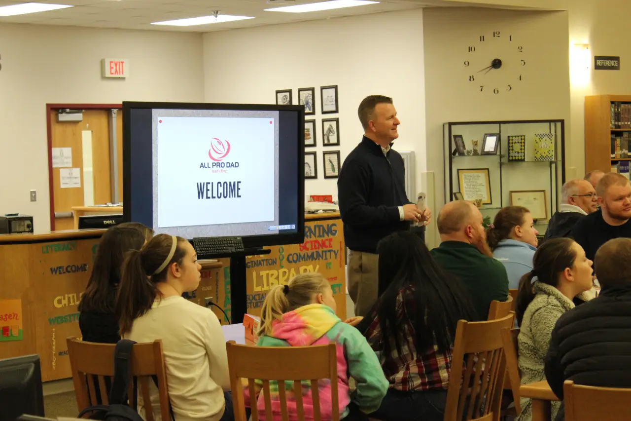 Christopher A. Rhyne with a community