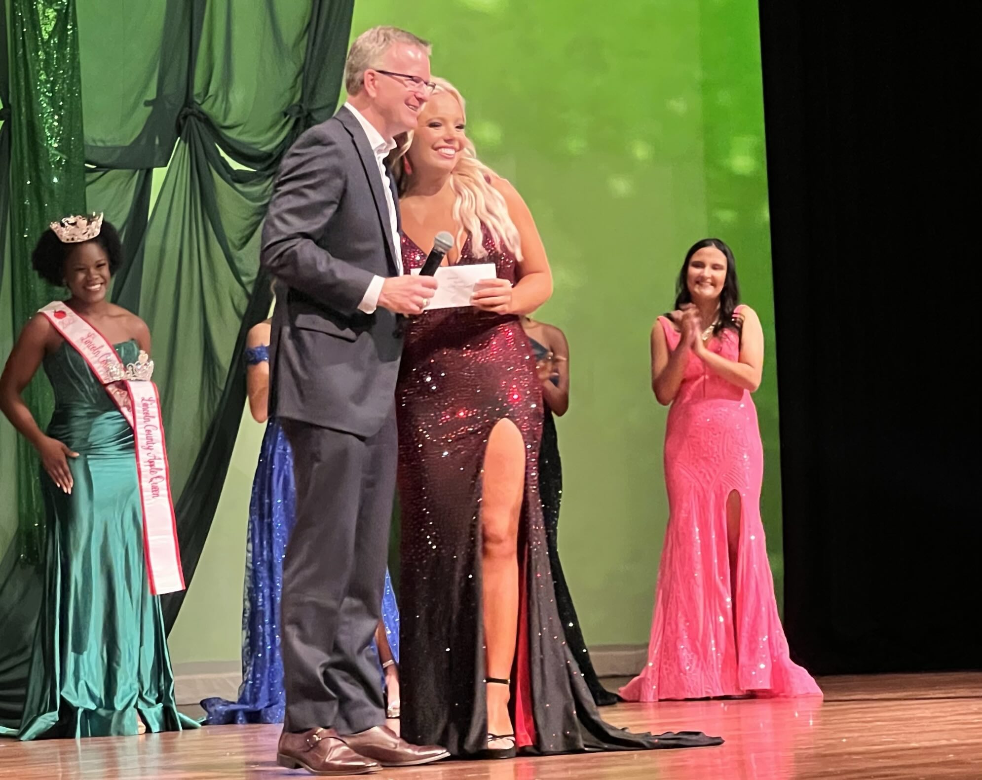 Kathryn Burgess with Christopher A. Rhyne presenting an award