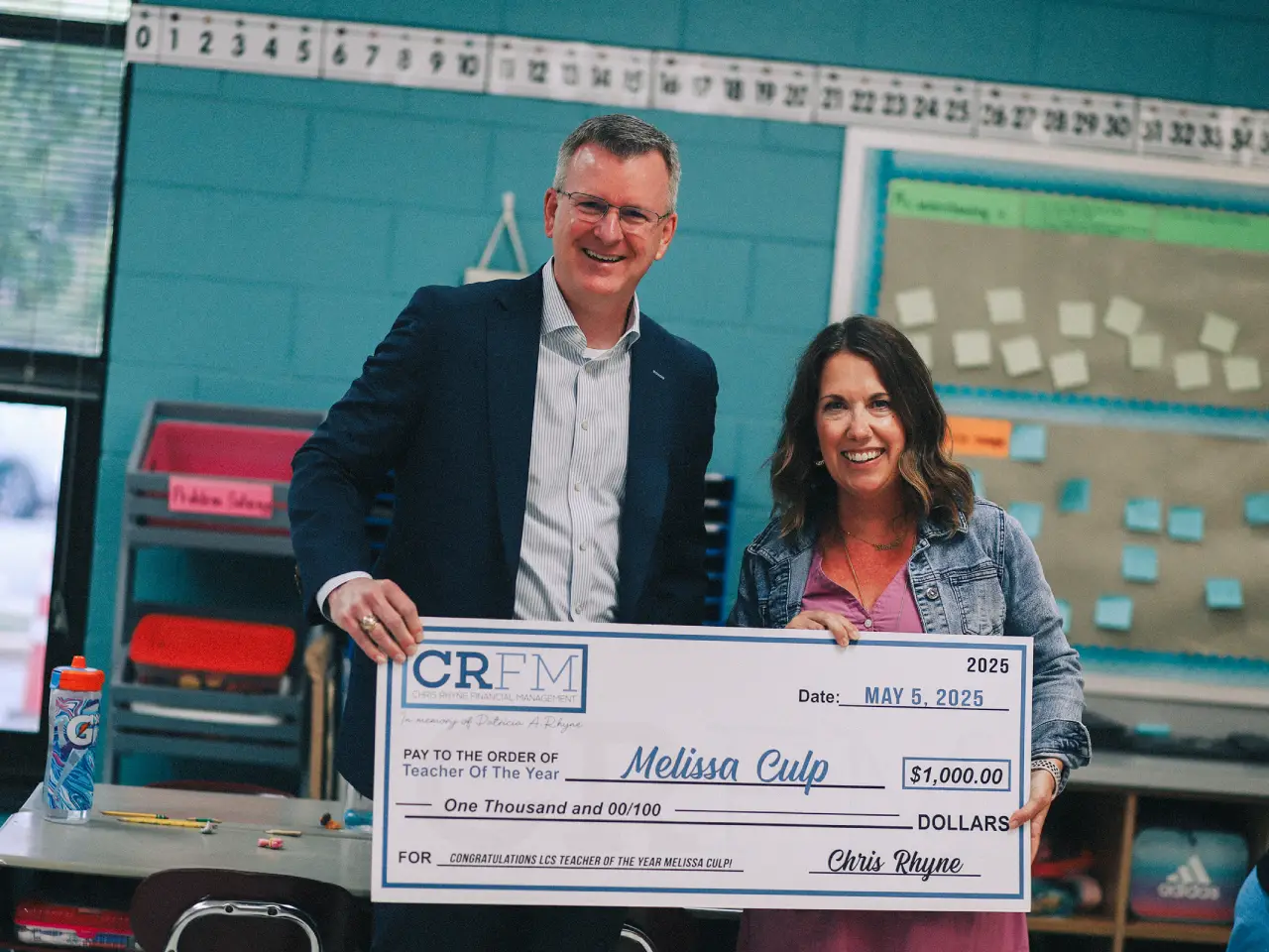Christopher A. Rhyne with a community member